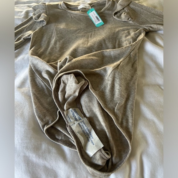 Heathery Ursa Ruffle Shoulder
Knit Bodysuit - Picture 6 of 8